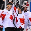 GANGNEUNG, SOUTH KOREA - FEBRUARY 24: Canada's Wojciech Wolski #8 and Chay Genoway #5 celebrate after a 6-4 win over Team Czech Republic during bronze medal round action at the PyeongChang 2018 Olympic Winter Games. (Photo by Matt Zambonin/HHOF-IIHF Images)

